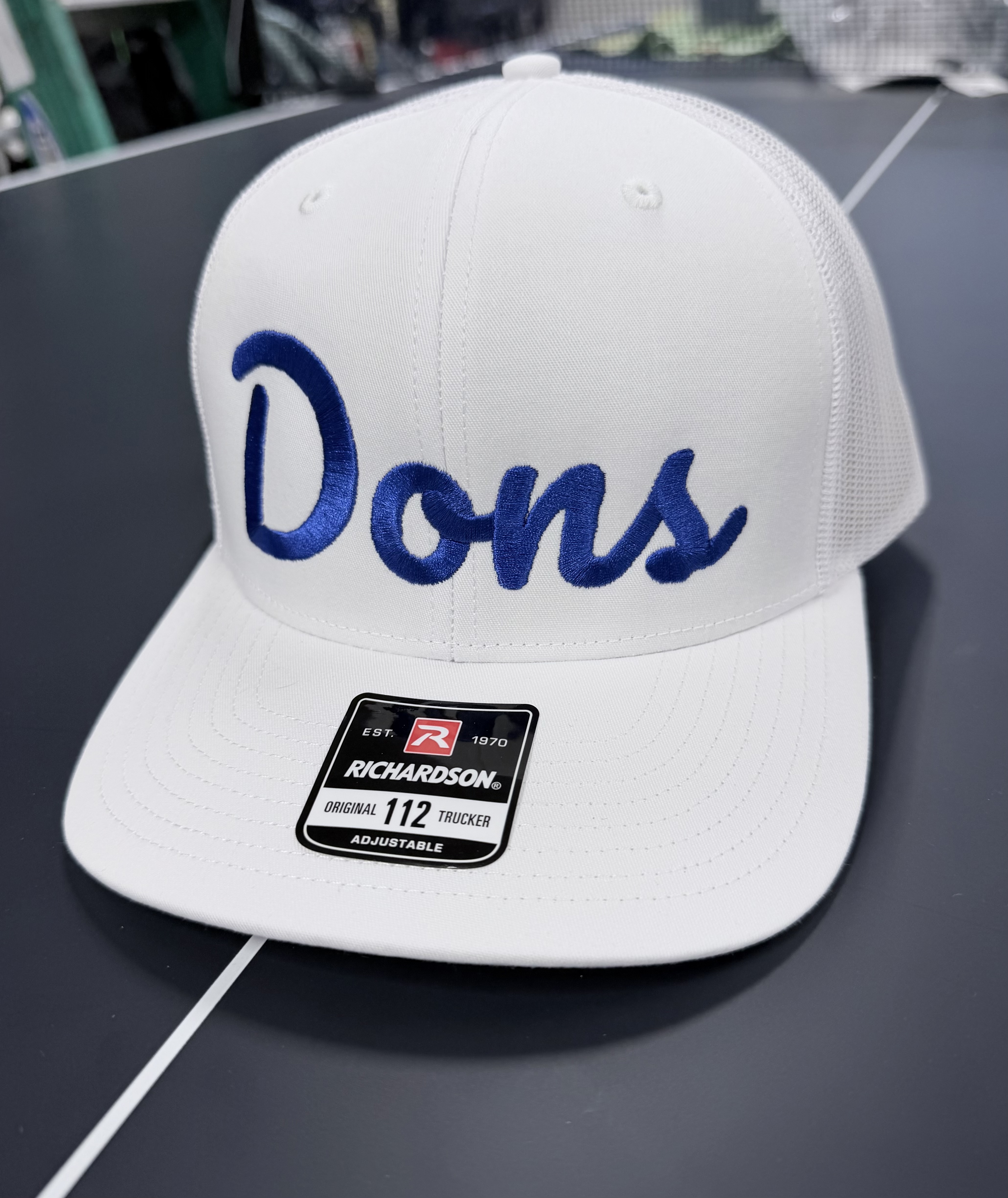 Dons script (White)